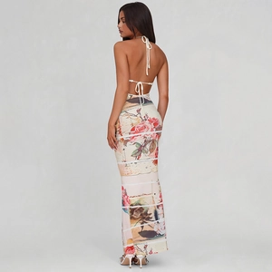 Detail of sexy backless halter dress with vintage floral and newspaper print