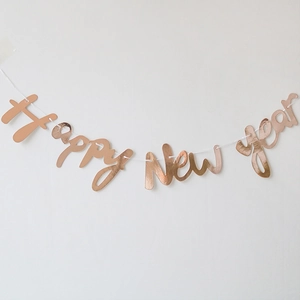 Rose gold Happy New Year banner in cursive font for 2024 party backdrop decoration