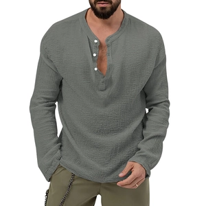 Detail view of dark grey long sleeve Henley shirt with breathable seersucker texture