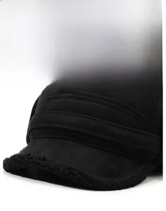 Close-up of the stylish black winter hat brim showing premium suede and fleece stitching