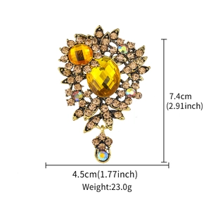 Vintage luxury golden flower brooch with amber crystals and rhinestones, 7.4cm x 4.5cm