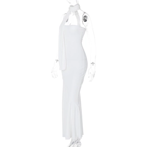 Detail of slim fit white tube dress and matching shawl on a fashion mannequin