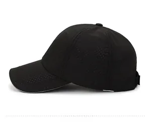 Side view of black quick-dry baseball cap featuring breathable laser-cut perforations
