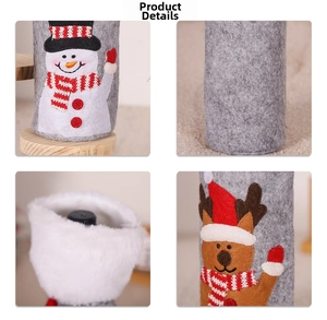Detail of Christmas wine bottle covers showing snowman and reindeer felt craftsmanship
