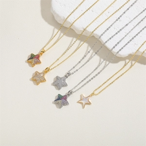 Flat lay of star-shaped necklaces with zircon inlays and colorful stone textures