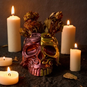 Gothic skull candle holder mold with dual-tone metallic finish and floral relief carvings