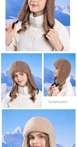 Close-up of quilted waterproof fabric and thick faux shearling lining on winter earflap hat