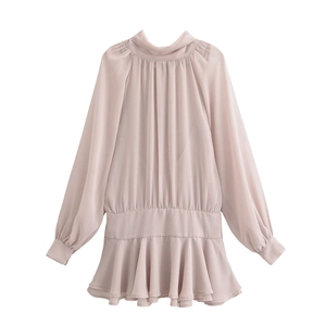 Elegant pale pink chiffon mini dress with lantern sleeves and ruffled hem details