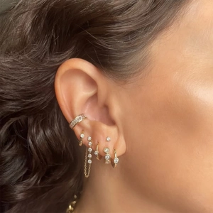 Gold stainless steel cuff earring set with sparkling rhinestones and delicate chains