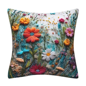 Close-up of 3D floral embroidery on decorative pillowcase with vibrant colorful petals