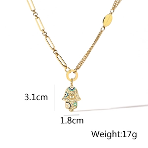 Detail shot of Hamsa Hand and Evil Eye pendant with 3.1cm height and 17g weight