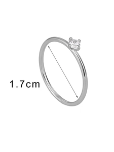 Macro view of four-prong cubic zirconia ring with 1.7cm inner diameter dimension