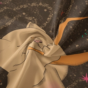 Close-up of the woven fabric texture showing a cartoon cat pattern and folding details