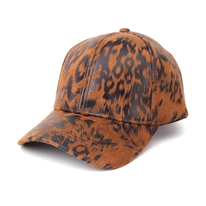 Detail shot of brown leopard print baseball cap with textured faux leather finish