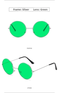 Detail of retro round sunglasses with silver metal frame and vibrant green lenses