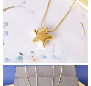 Detailed comparison of gold and silver star pendants on sleek snake chain necklaces