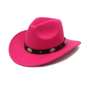 Close-up of pink wool cowboy hat with black leather band and silver metal conchos