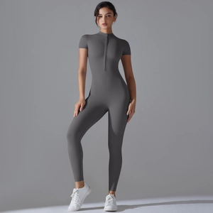 Detail of high-elasticity grey yoga bodysuit featuring stand-up collar and front half-zipper