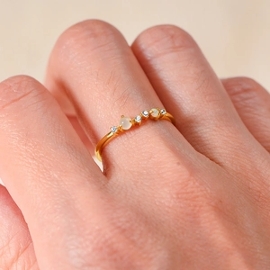 Elegant S925 silver gold ring with natural moonstone and opal worn on a hand