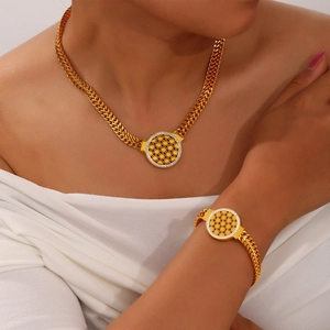 Ensemble de bijoux en acier titane doré avec collier fleur de vie et son bracelet