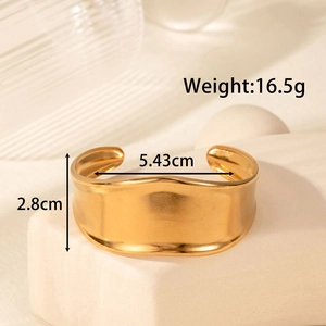 Exaggerated golden stainless steel wavy wide cuff bracelet with a textured wrinkled design