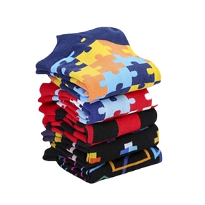 Set of colorful cotton ankle socks with geometric patterns and puzzle designs for men
