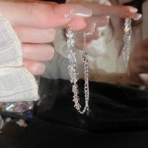 Detail of zircon flower bracelet with lobster clasp and adjustable extension chain