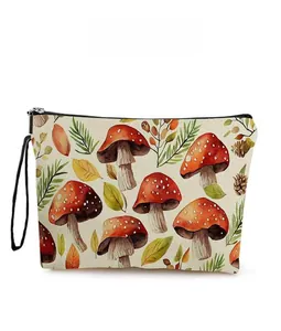 Detail of mushroom and botanical pattern printed on a durable fabric toiletry storage bag