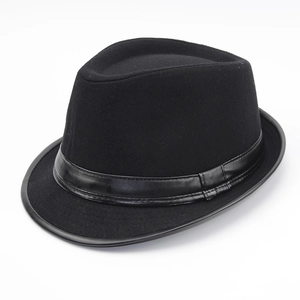 Classic black fedora wool felt hat with leather band in a professional studio shot