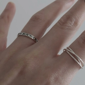 Retro geometric pattern and triple-layer interlaced 925 sterling silver rings on finger