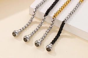 Close-up of four-color stainless steel box chains with round magnet ball clasps