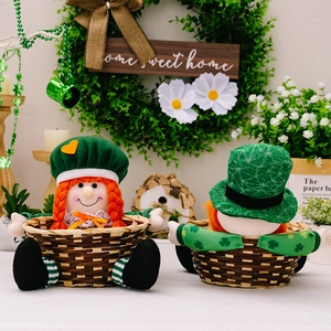 Close-up of St. Patrick's Day doll candy baskets with green shamrock hat and orange braids