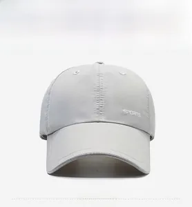 Detail view of light grey quick-dry baseball cap with white SPORTS side print
