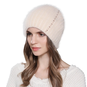 Women's winter rabbit fur knit hat in beige with vertical stripes and pearl accents