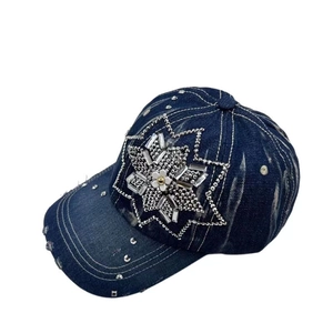 Women's blue denim baseball cap with rhinestone star design and washed distressed finish