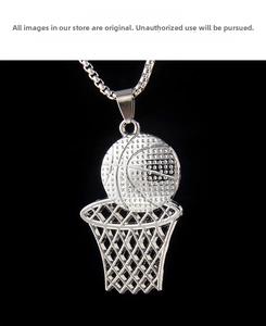 Detailed view of silver basketball and net pendant with textured surface and ball chain