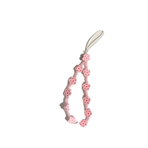 Pink floral beaded phone charm strap with heart-shaped accents for iPhone wristlet