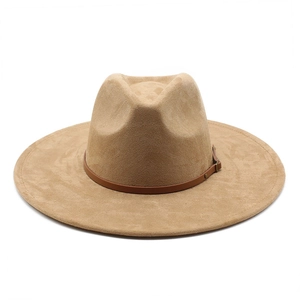 Close-up of khaki suede jazz hat featuring dark brown leather band and metal buckle