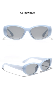 Detail view of jelly blue retro square sunglasses with wide temples and gray lenses