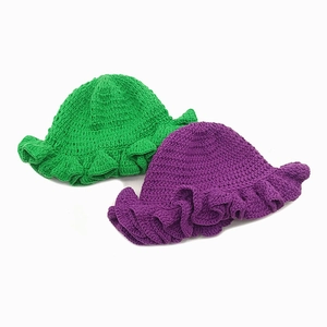 Fashionable knitted ruffle bucket hat in bright green and purple colors for women