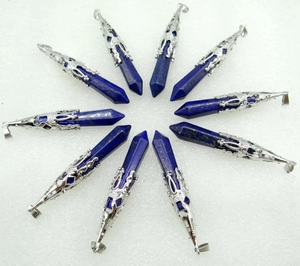 Top view of ten lapis lazuli hexagonal point pendants with silver filigree caps in a circle
