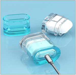 Detail view of precise charging port cutouts on clear and light blue earphone cases
