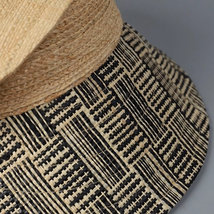 Lafia straw visor hat with a yellow and black geometric woven pattern and top-less design