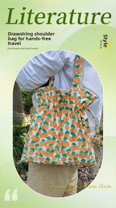 Detalle del bolso de hombro con cordón con estampado de naranjas y tejido de lona