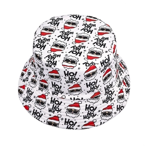 Reversible Christmas bucket hat with Santa Claus print and HO! HO! HO! text pattern