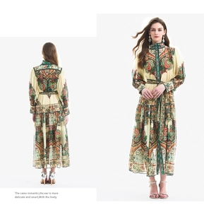 Detail of vintage paisley print dress with lantern sleeves and ruffled waist detail