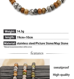 Detail of beaded bracelet made of natural picture stone and stainless steel chain