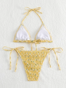 Two-piece triangle bikini set with yellow daisy print and side-tie ruffled bottoms