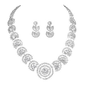 Luxurious silver bridal jewelry set featuring sparkling rhinestone necklace and earrings