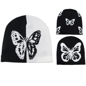 Winter knitted butterfly pattern beanies in black and white for warmth and style